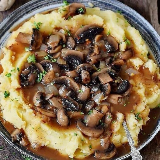 Mashed potatoes with a hearty mushroom lentil stew