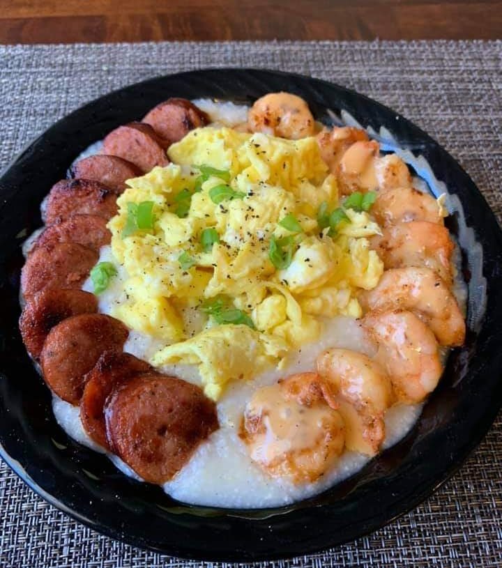 Grits bowl with Sausage, Shrimp (with Cajun honey butter sauce, and ...